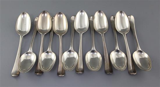 Twelve George III silver Hanoverian pattern tablespoons, by Isaac Callard, 28.5 oz.